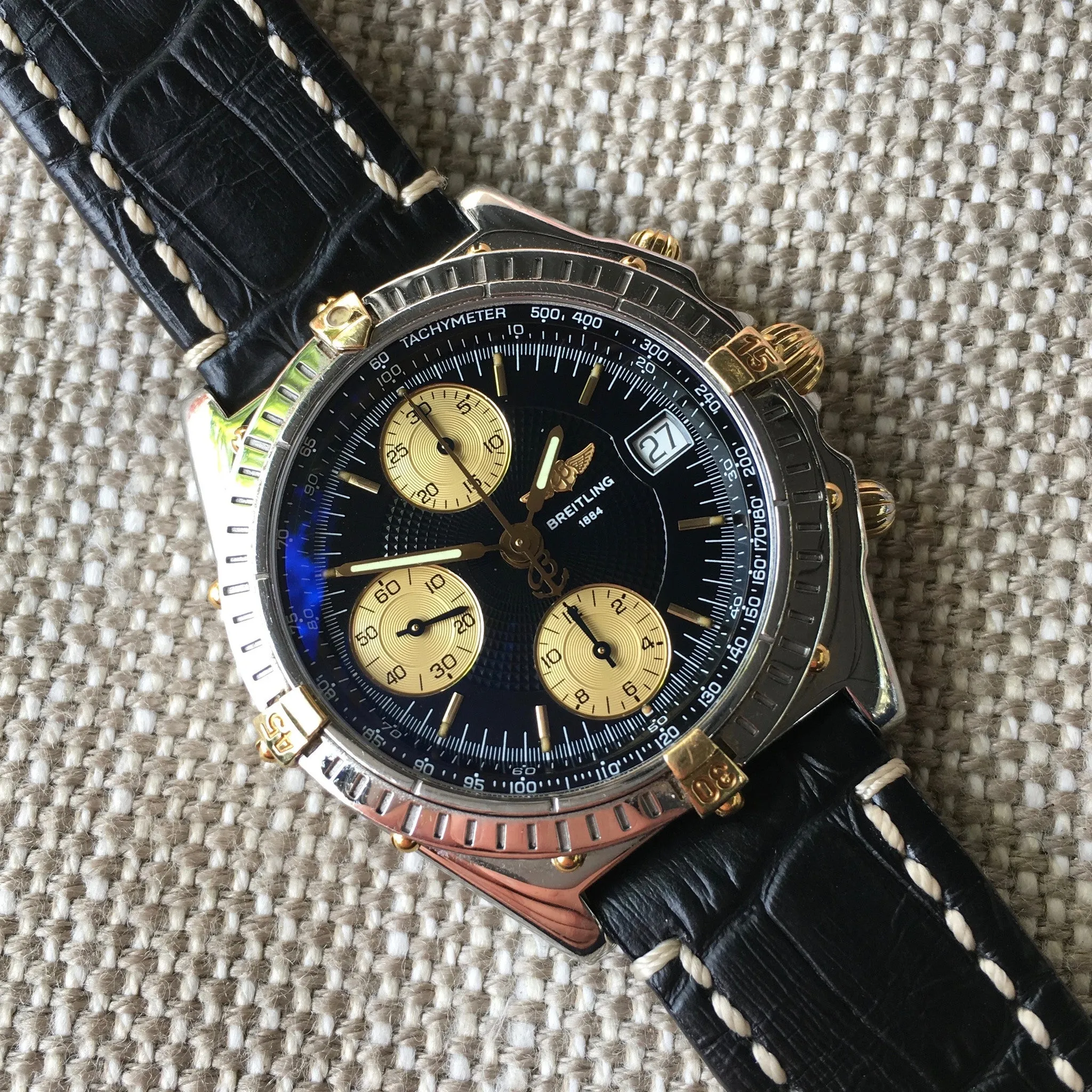 Breitling Chronomat B13050.1 Chronograph Two Tone Steel Gold Black Automatic Wristwatch