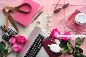 Pink Notebook, Coffee & Laptop. Stock Photo