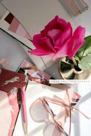 Pink Rose, Sunglasses and Notebook. Stock Photo